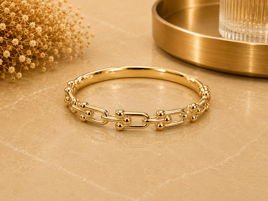 BRAZALETE DORADO EN ACERO INOXIDABLE