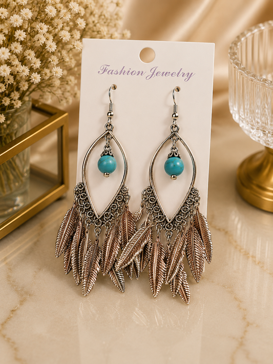 Aretes de fantasía bohemios con turquesa y plumas