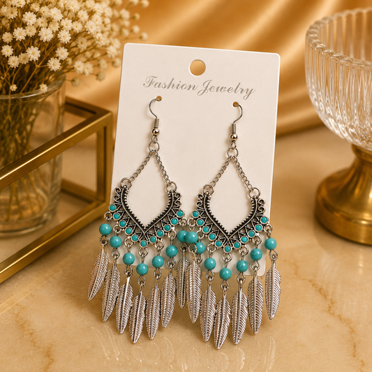 Aretes de fantasía bohemios con turquesa y plumas