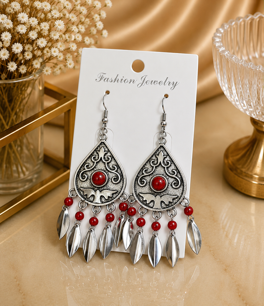 Aretes de fantasía étnicos con piedra roja y colgantes