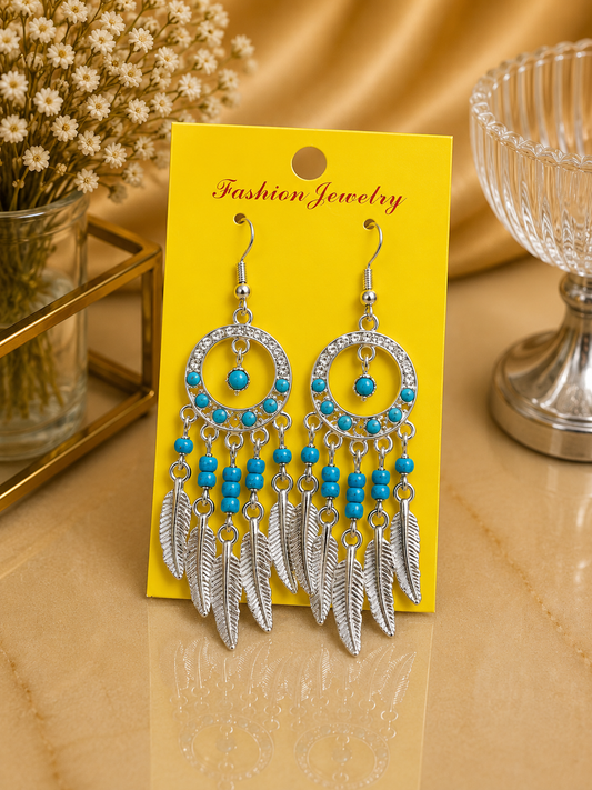 Aretes de fantasía estilo atrapasueños con turquesa