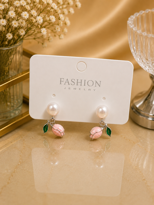 Aretes de fantasía con perla y rosa
