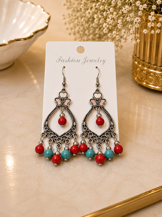 Aretes de fantasía bohemios con cuentas rojas y turquesa
