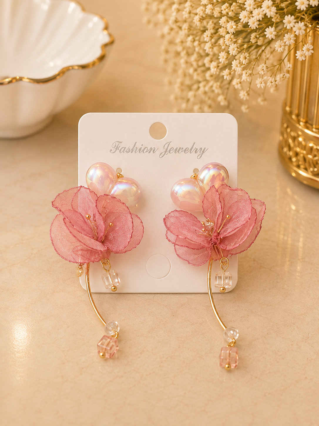 Aretes de fantasía flor rosa con perlas tornasol