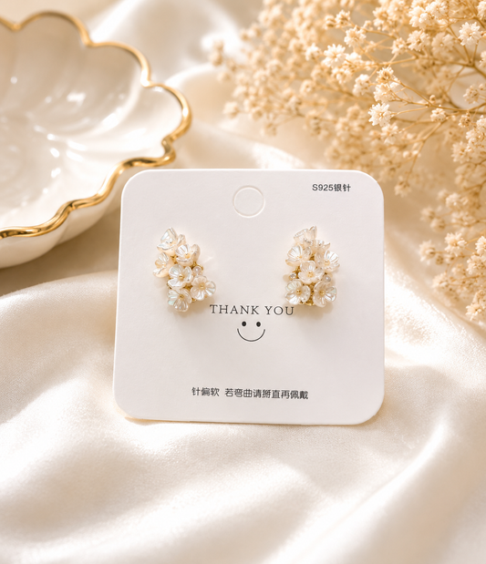 Aretes de fantasía con mini flores y perlas