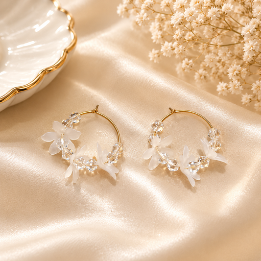 Aretes de fantasía tipo aro con flores y cristales
