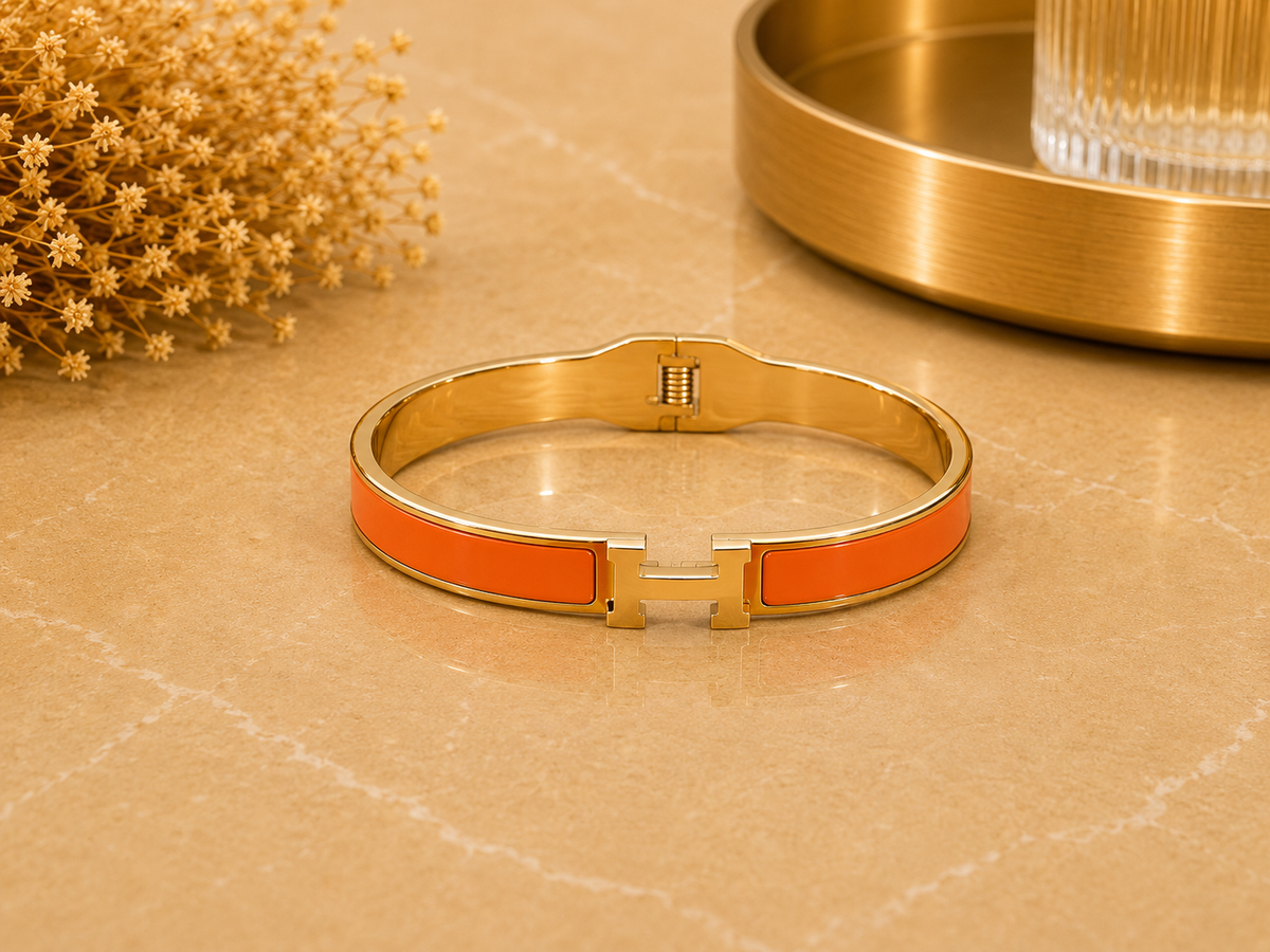 BRAZALETE ACERO H NARANJA